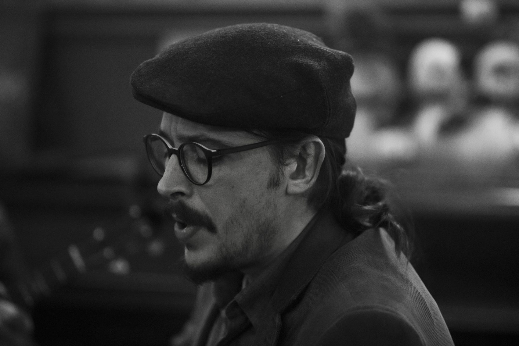 Black-and-white portrait of Marc Wencelius in profile