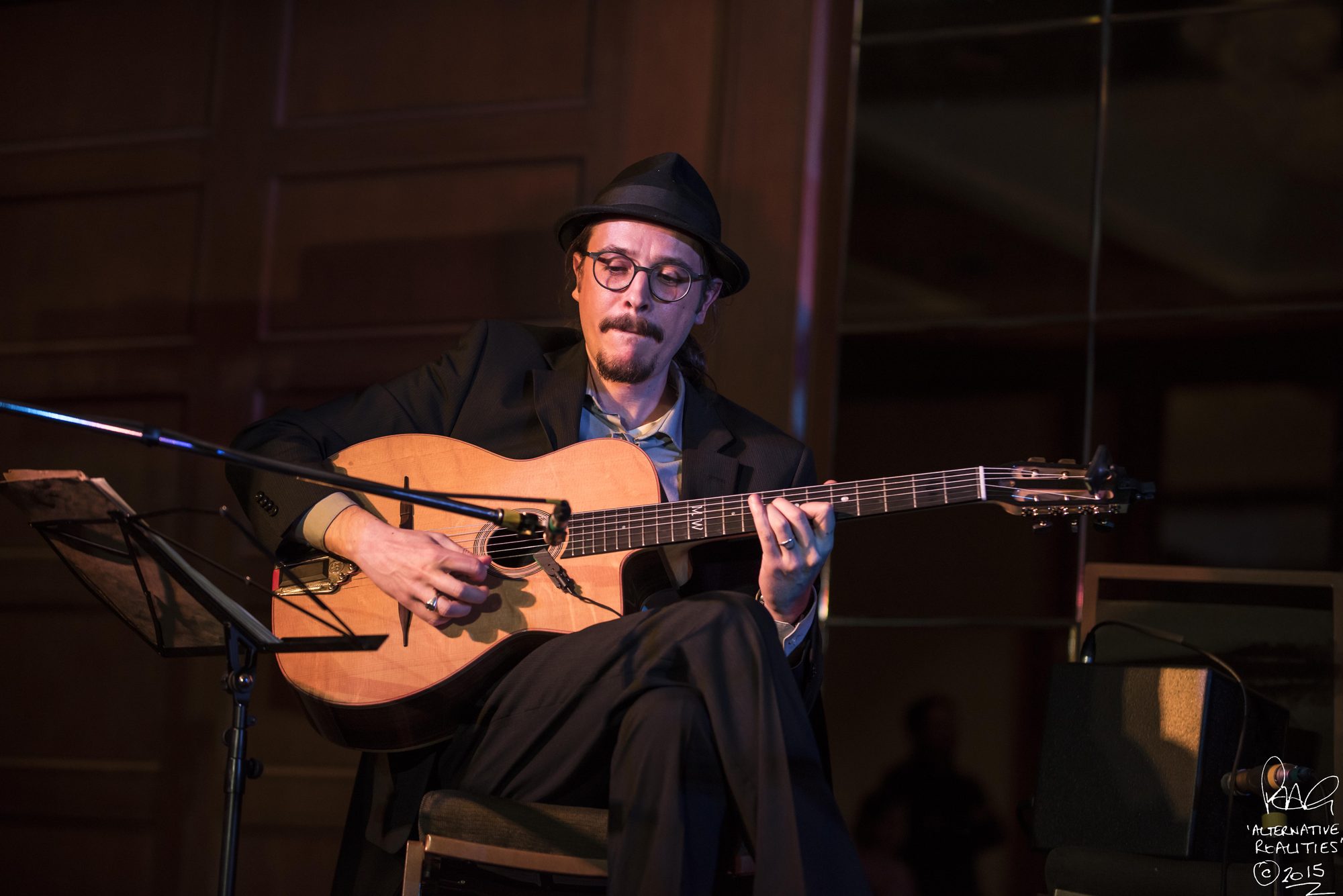Marc Wencelius performing on guitar, 2015